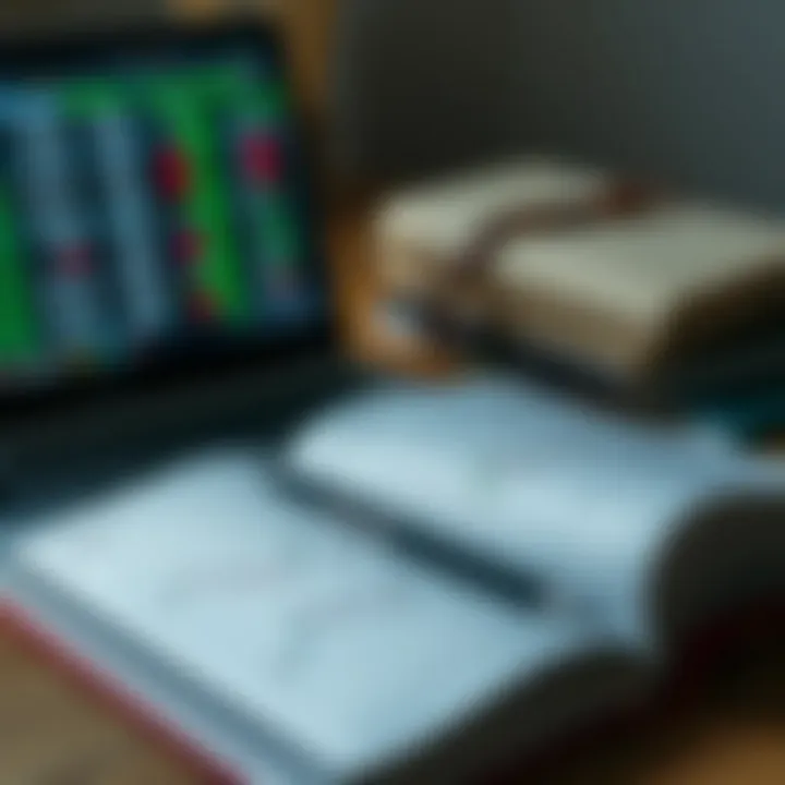 Open book with financial graphs and notes beside a laptop showing currency exchange rates